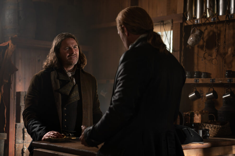 Outlander Season 8 Episode 3 - Kieran Bew (“Captain Cunningham”) and Sam Heughan (“Jamie Fraser”). Photo courtesy of STARZ