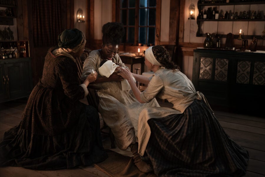 Outlander Season 8 Episode 3 - Sapphire Joy ("Binta"), Estella Daniels ("Susannah Whitaker"), and Caitríona Balfe (“Claire Fraser”). Photo courtesy of STARZ