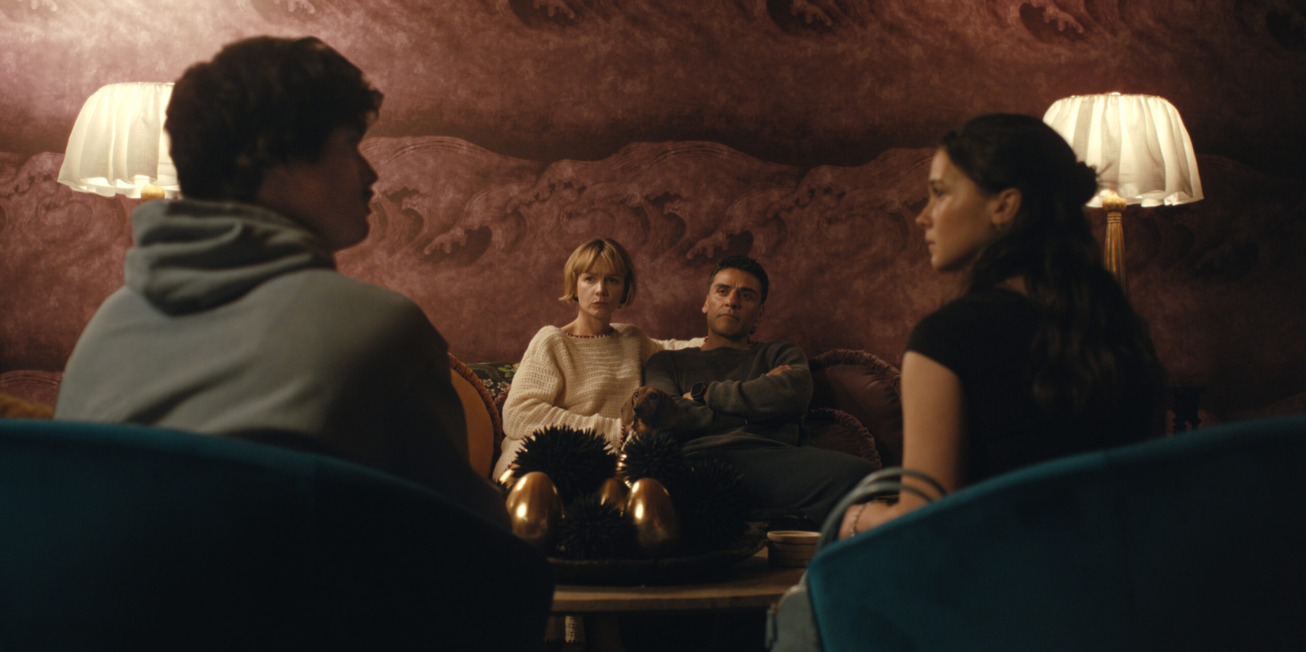 Beef Season 2 - (l-r) Charles Melton as Austin Davis, Carey Mulligan as Lindsay Crane-Martin, Oscar Isaac as Josh Martin, and Cailee Spaeny as Ashley Miller