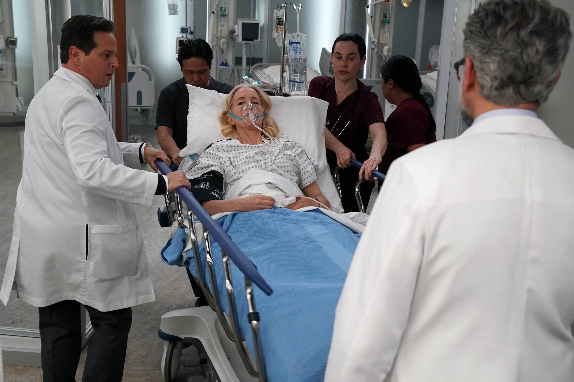 Still from Doc Season 2 Episode 20 of Scott Wolf, Felicity Huffman and Omar Metwally pictured from left to right.