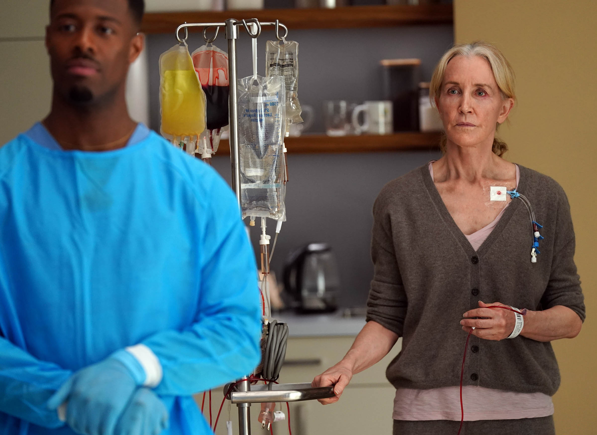 Still from Doc Season 2 Episode 21 of Patrick Walker and Felicity Huffman pictured from left tor right.
