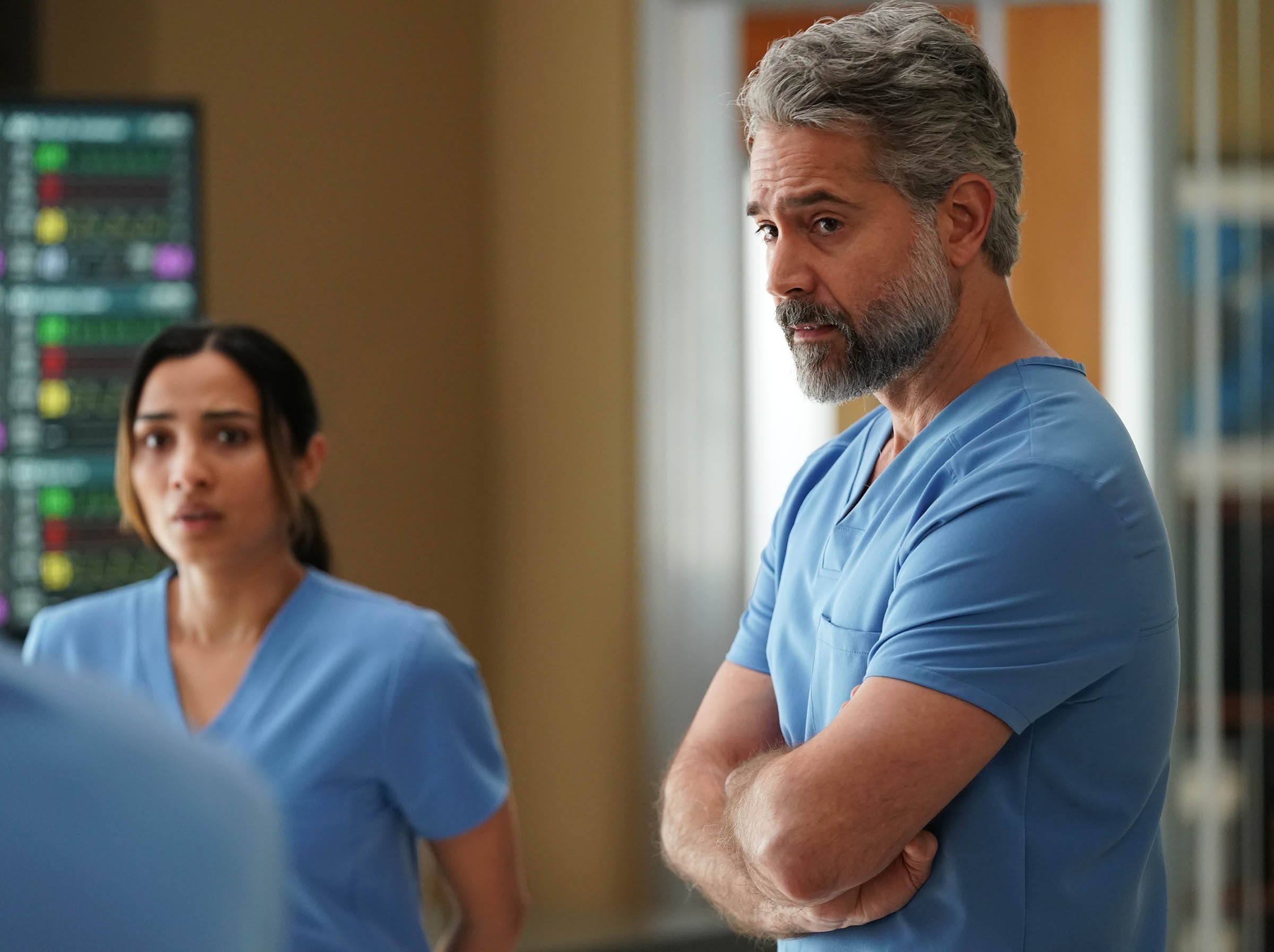 Still from Doc Season 2 Episode 22 of Anya Banerjee and Omar Metwally pictured from left to right.