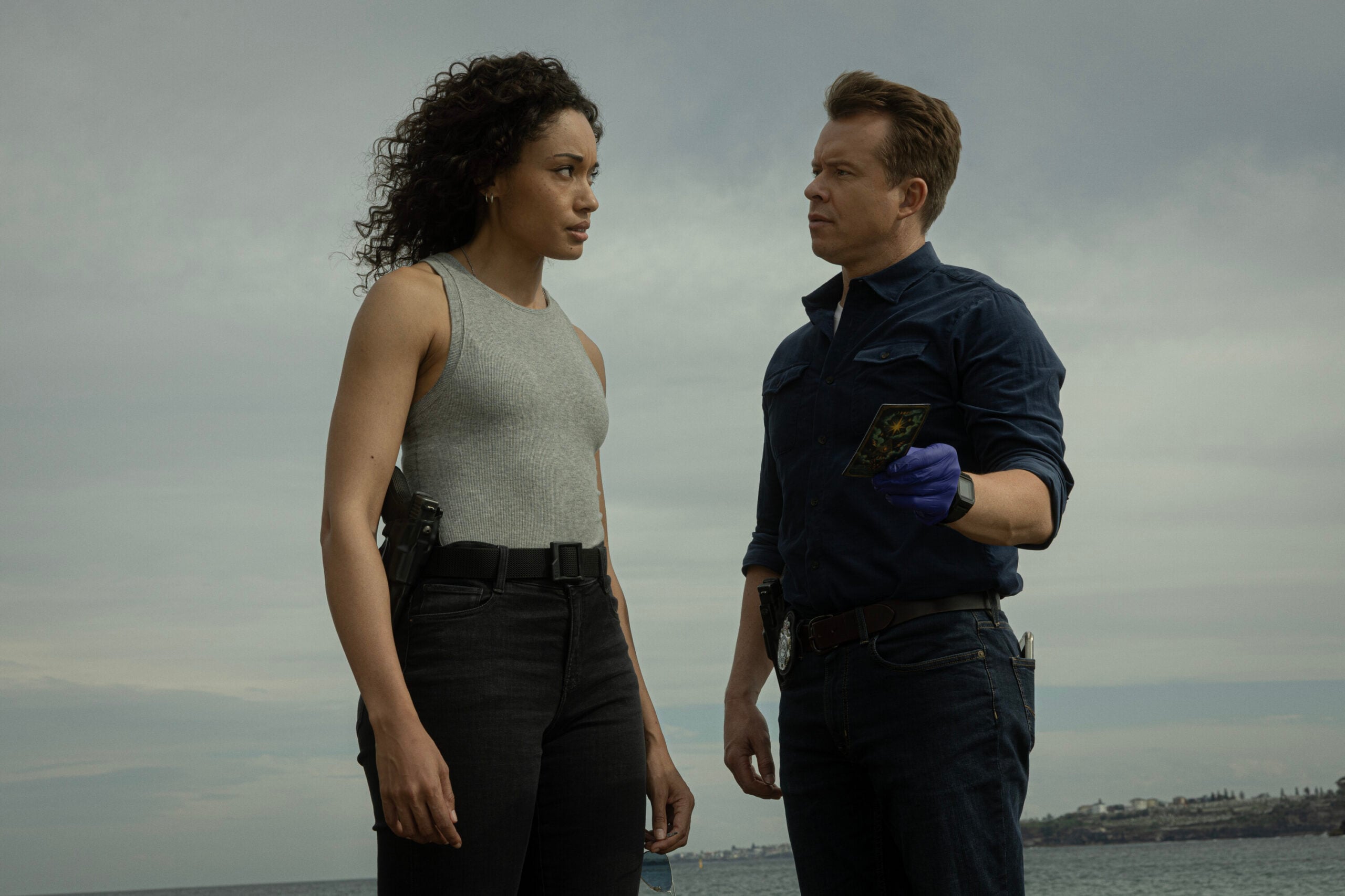 NCIS: Sydney Season 3 Episode 14, "Death Card" -- Olivia Swann as NCIS Special Agent Captain Michelle Mackey and Todd Lasance as AFP Liaison Officer Sergeant Jim 'JD' Dempsey