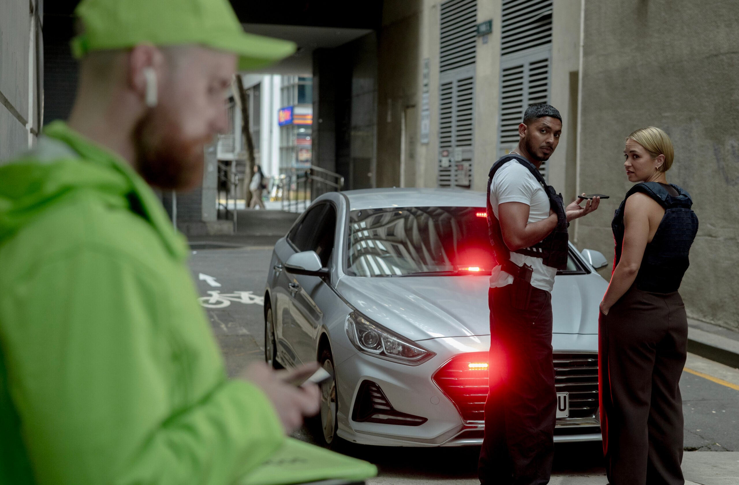 NCIS: Sydney Season 3 Episode 16, "Ticker" -- Sean Sagar as NCIS Special Agent DeShawn Jackson and Tuuli Narkle as AFP Liaison Officer Constable Evie Cooper
