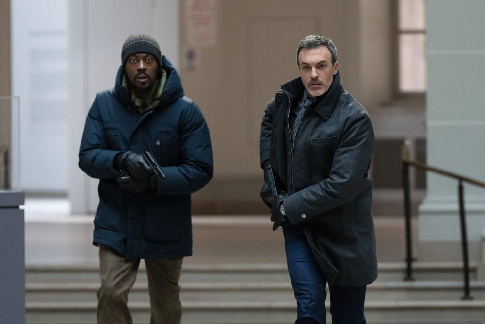 Law & Order Season 25 Episode 17, "Beyond Measure" - (l-r) David Ajala as Det. Theo Walker and Reid Scott as Detective Vincent Riley