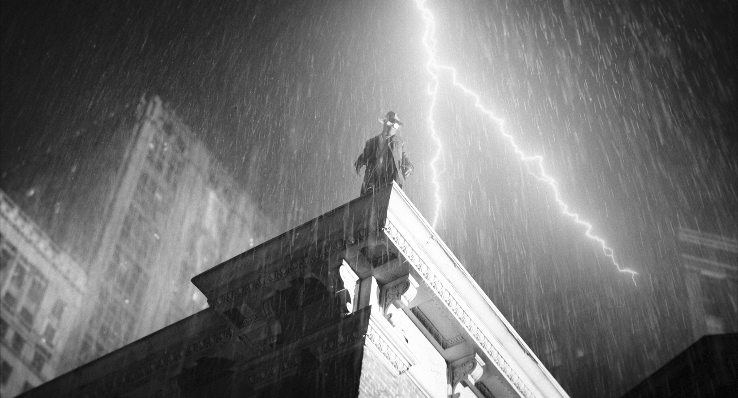 Spider-Noir - Nicolas Cage | Tell-Tale TV Still from black and white version of Spider Noir of Nicolas Cage as The Spider. Spider-Noir Review: What if Sam Spade had Superpowers Still from black and white version of Spider Noir of Nicolas Cage as The Spider.