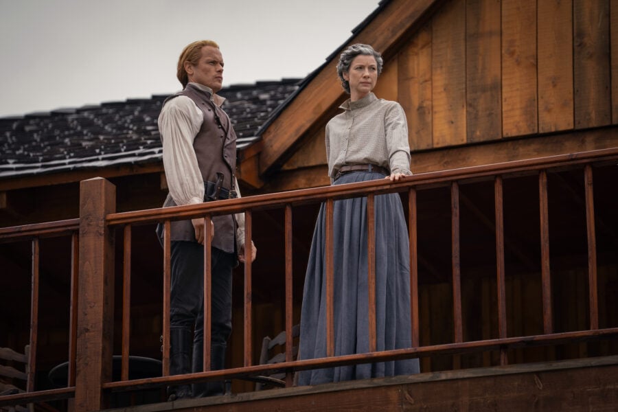Outlander 809 — In the Forest, Left to Right: Sam Heughan (“Jamie Fraser”) and Caitríona Balfe (“Claire Fraser”)