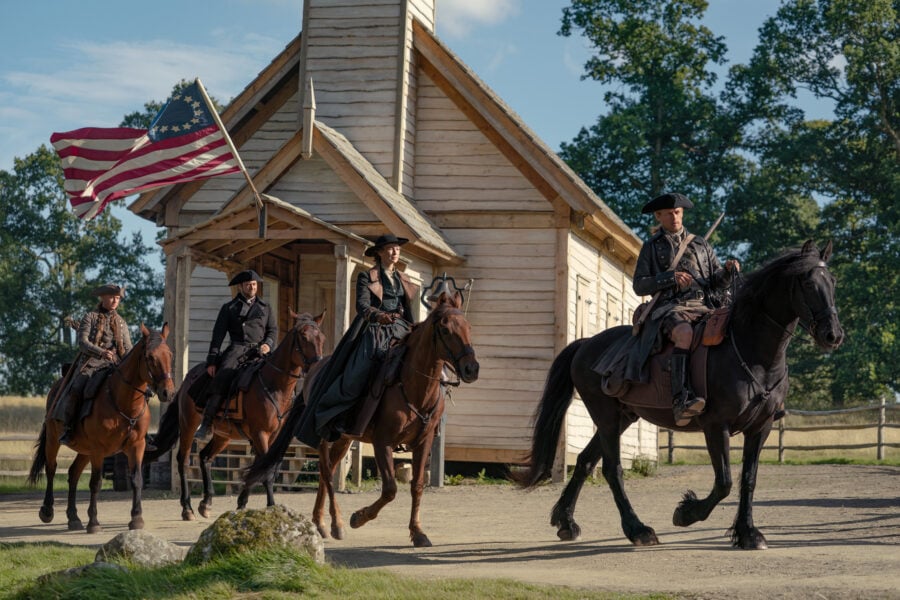 Outlander 810 — And the World Was All Around Us. Left to Right: John Bell (“Young Ian”), Richard Rankin ("Roger MacKenzie"), Caitríona Balfe (“Claire Fraser”), and Sam Heughan (“Jamie Fraser”) | Tell-Tale TV Outlander 810 — And the World Was All Around Us. Left to Right: John Bell (“Young Ian”), Richard Rankin ("Roger MacKenzie"), Caitríona Balfe (“Claire Fraser”), and Sam Heughan (“Jamie Fraser”) Outlander Season 8 Episode 10 Review: And the World Was All Around Us