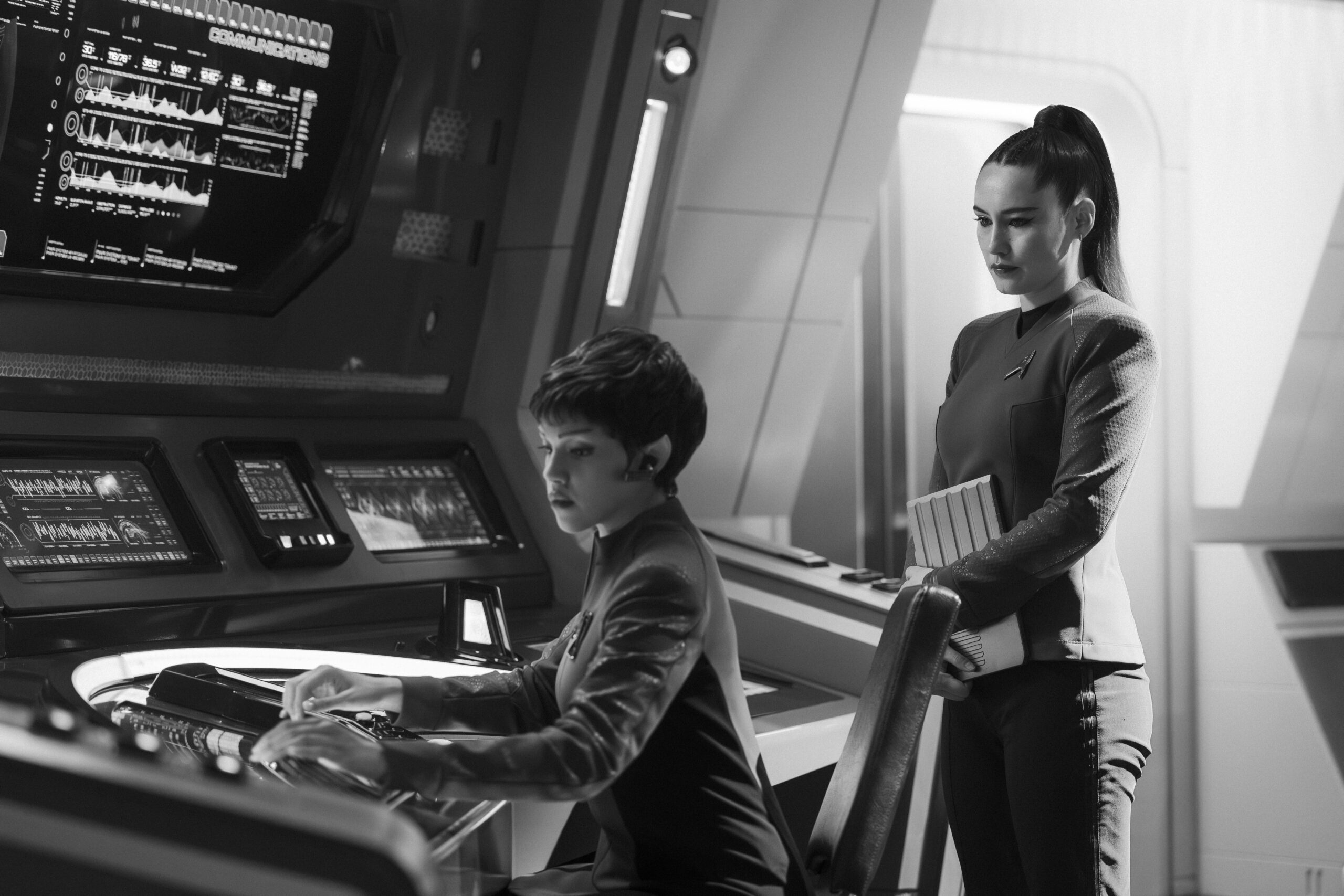 Star Trek: Strange New Worlds Season 4 Episode 4 - Bianca Nugara and Christina Chong | Tell-Tale TV Still from Star Trek: Strange New Worlds Season 4 Episode 4 of Bianca Nugara as A Star Trek: Strange New Worlds Season 4 Episode 4 Preview: Forget it Una, its Klingon Territory Still from Star Trek: Strange New Worlds Season 4 Episode 4 of Bianca Nugara as A'Sha and Christina Chong as La’an Noonien-Singh pictured from left to right.'Sha and Christina Chong as La’an Noonien-Singh pictured from left to right.