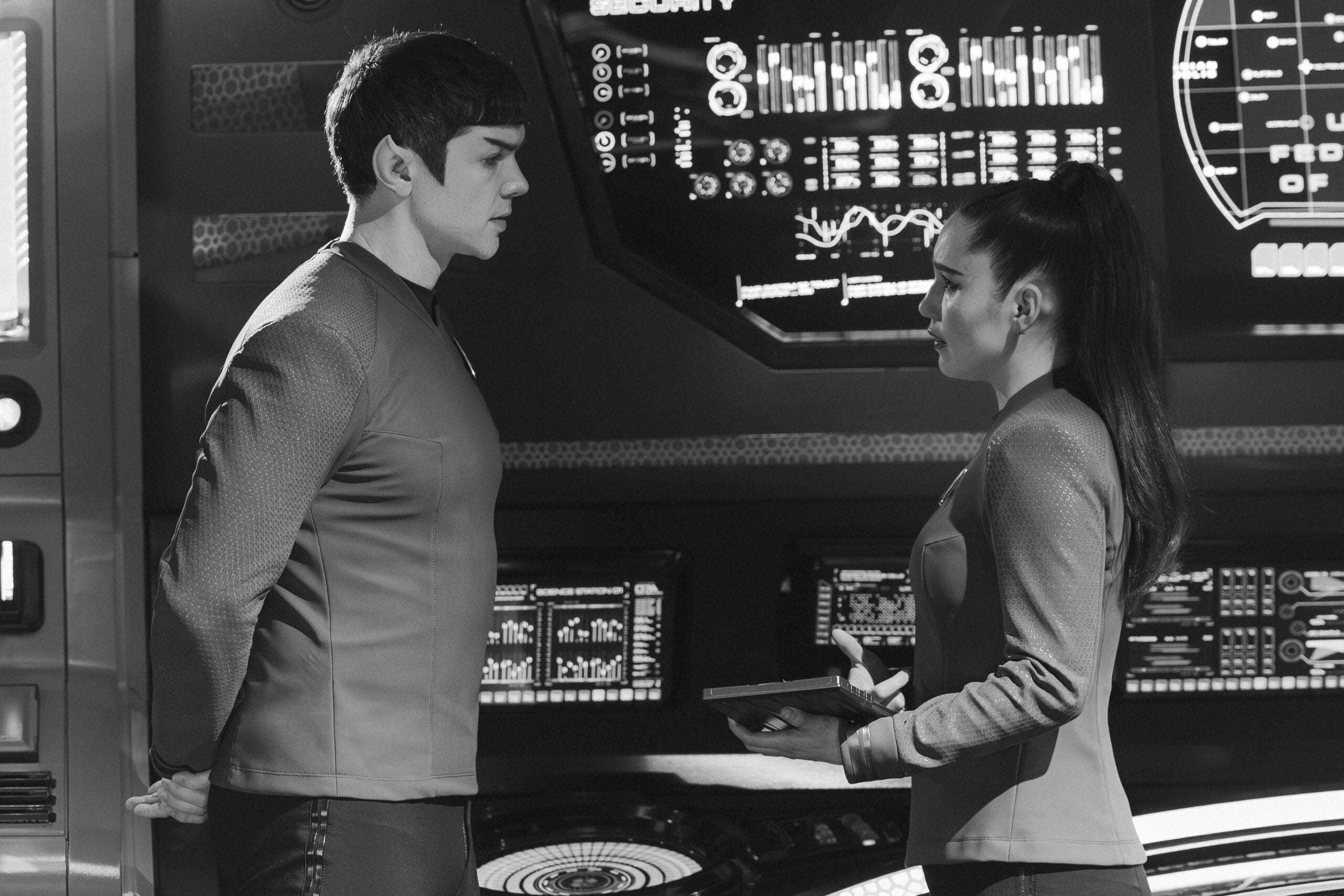 Star Trek: Strange New Worlds Season 4 Episode 4 - Ethan Peck and Christina Chong | Tell-Tale TV Still from Star Trek: Strange New Worlds Season 4 Episode 4 of Ethan Peck as Spock and Christina Chong as La’an Noonien-Singh pictured from left to right. Star Trek: Strange New Worlds Season 4 Episode 4 Preview: Forget it Una, its Klingon Territory Still from Star Trek: Strange New Worlds Season 4 Episode 4 of Ethan Peck as Spock and Christina Chong as La’an Noonien-Singh pictured from left to right.