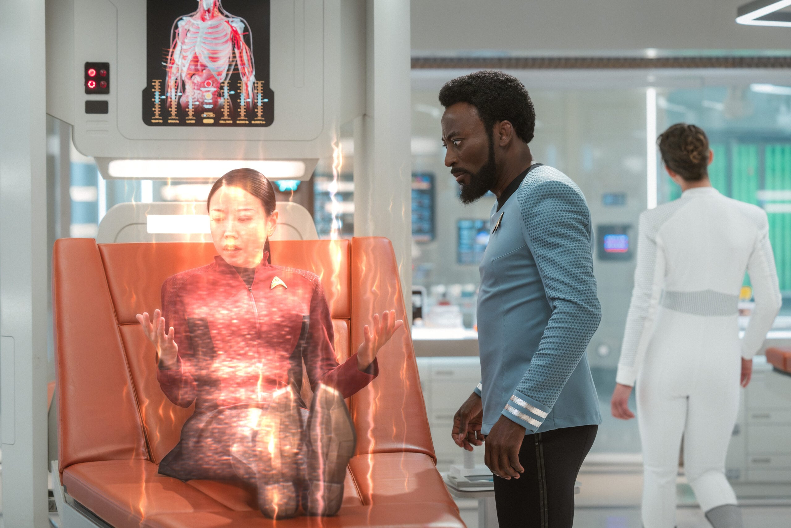 Still from Star Trek: Strange New Worlds of Babs Olusanmokun as Dr. M’Benga. Star Trek: Strange New Worlds Season 4 Episode 5 Preview: Brought to You by The Letter P Still from Star Trek: Strange New Worlds of Babs Olusanmokun as Dr. M’Benga.