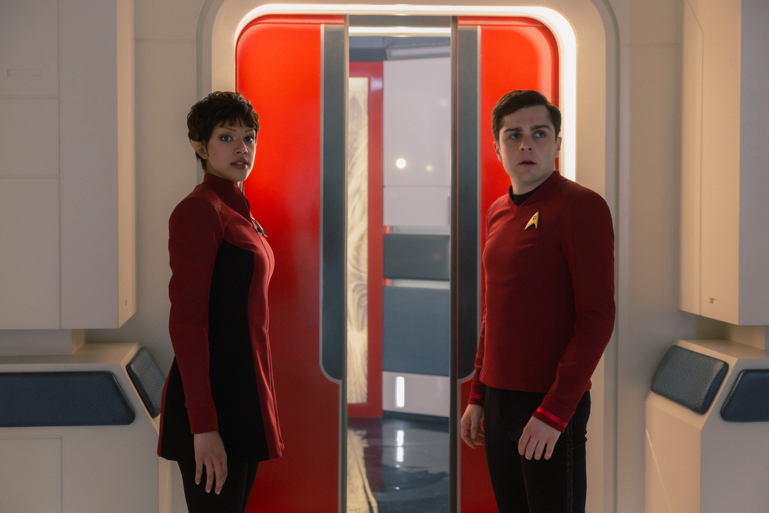 Star Trek: Strange New Worlds Season 4 Episode 6 - Bianca Nugara and Martin Quinn | Tell-Tale TV Still from Star Trek: Strange New Worlds Season 4 Episode 6 of Bianca Nugara as A Star Trek: Strange New Worlds Season 4 Episode 6 Preview: Need for Speed Still from Star Trek: Strange New Worlds Season 4 Episode 6 of Bianca Nugara as A'Sha and Martin Quinn as Scotty pictured from left to right.'Sha and Martin Quinn as Scotty pictured from left to right.