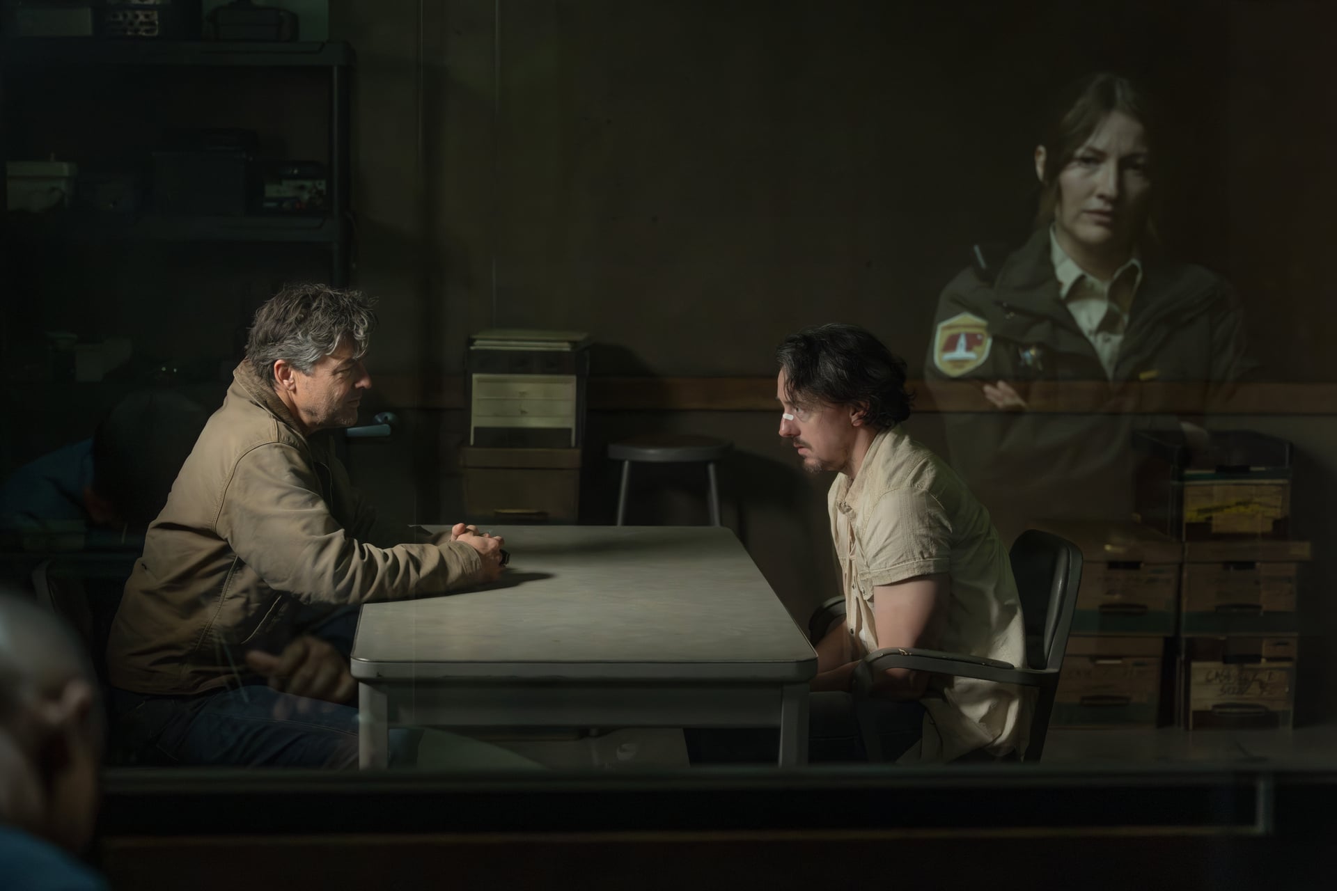 Lanterns Season 1 Episode 1 - (l-r) Kyle Chandler, Chris Coy, and Kelly MacDonald Lanterns Season 1 Episode 1 Review: John Stewart’s First Lessons Take a Turn