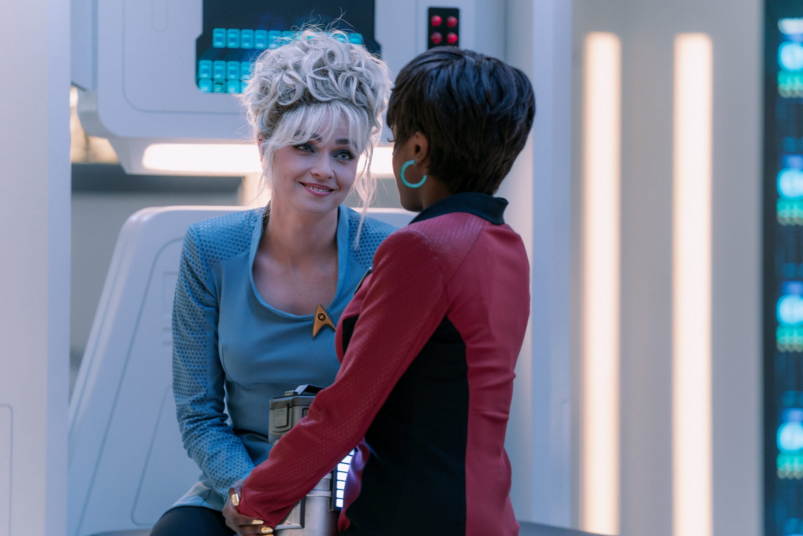 Star Trek: Strange New Worlds: Season 4 Episode 10 - Jess Bush and Celia Rose Gooding | Tell-Tale TV Still from Star Trek: Strange New Worlds: Season 4 Episode 10 - Jess Bush as Christine Chapel and Celia Rose Gooding as Uhura pictured from left to right. Star Trek: Strange New Worlds Season 4 Episode 10 Preview: A Timey Wimey Finale Still from Star Trek: Strange New Worlds: Season 4 Episode 10 - Jess Bush as Christine Chapel and Celia Rose Gooding as Uhura pictured from left to right.