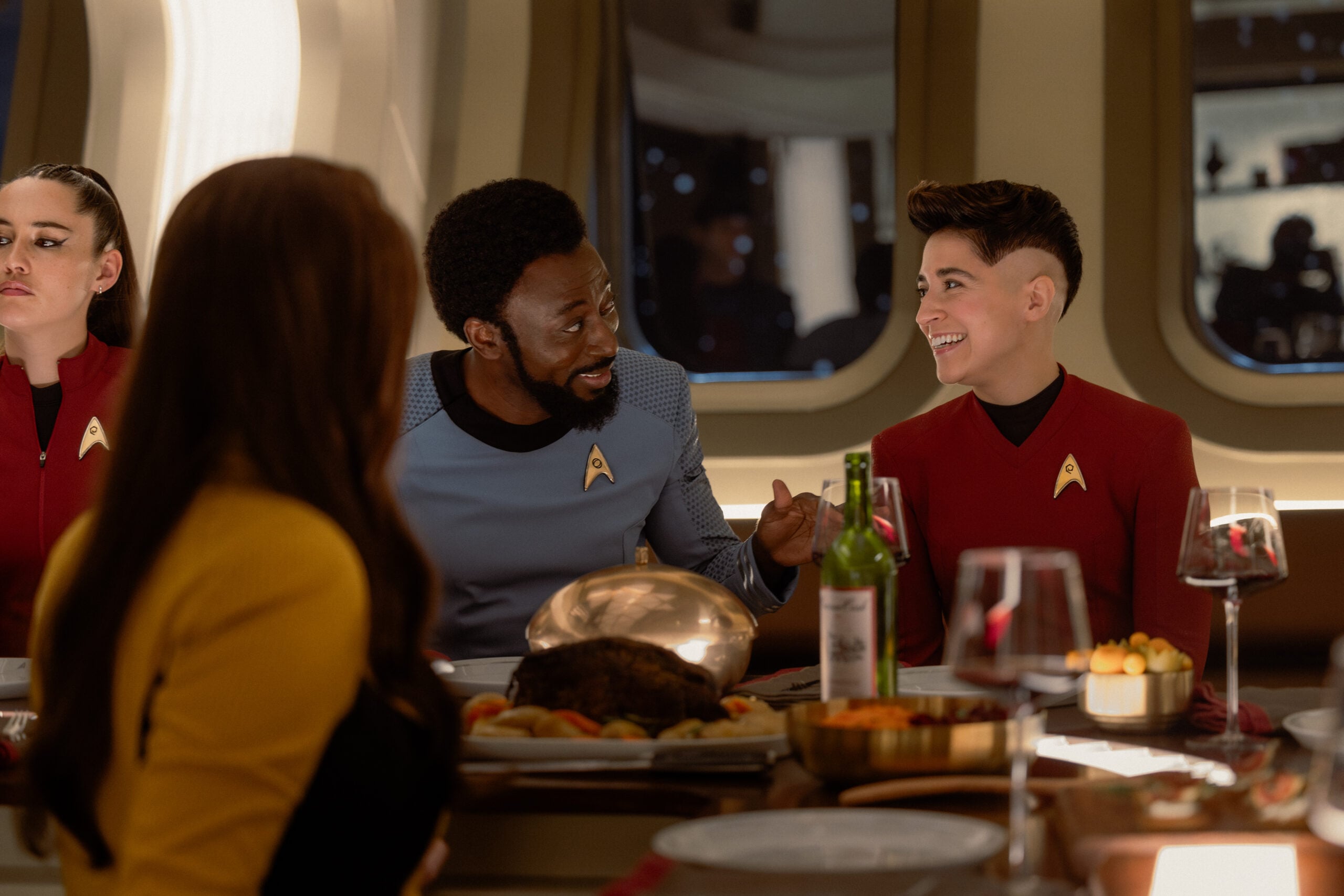 Star Trek: Strange New Worlds Season 4 Episode 10 - Babs Olusanmokun and Melissa Navia | Tell-Tale TV Still from Star Trek: Strange New Worlds Season 4 Episode 10 of Babs Olusanmokun as Dr. M’Benga and Melissa Navia as Erica Ortegas pictured from left to right. Star Trek: Strange New Worlds Season 4 Episode 10 Preview: A Timey Wimey Finale Still from Star Trek: Strange New Worlds Season 4 Episode 10 of Babs Olusanmokun as Dr. M’Benga and Melissa Navia as Erica Ortegas pictured from left to right.