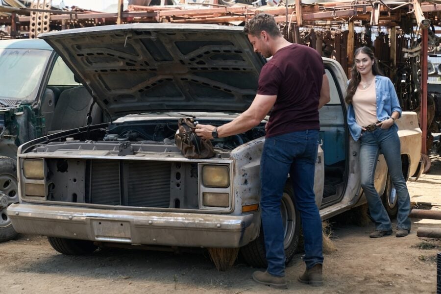 Justin Hartley as Colter Shaw working on a car What to Expect from Tracker Season 4 Episode 3: Original Parts