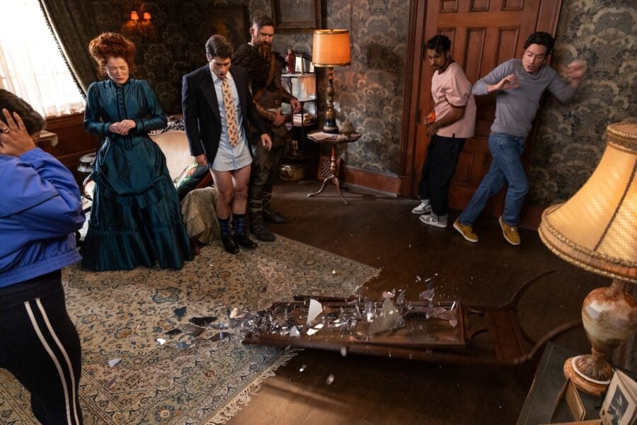 GHOSTS "Halloween 6: The Mirror - Part One" Pictured (L-R): Punam Patel as Bela, Rebecca Wisocky as Hetty, Devan Chandler Long as Thor, Utkarsh Ambudkar as Jay, and Ben Feldman as Kyle. Photo: Bertrand Calmeau/CBS ©2026 CBS Broadcasting, Inc. All Rights Reserved. | Tell-Tale TV GHOSTS "Halloween 6: The Mirror - Part One" Pictured (L-R): Punam Patel as Bela, Rebecca Wisocky as Hetty, Devan Chandler Long as Thor, Utkarsh Ambudkar as Jay, and Ben Feldman as Kyle. Photo: Bertrand Calmeau/CBS ©2026 CBS Broadcasting, Inc. All Rights Reserved. Ghosts Season 6 Episodes 1 and 2 Review: Séance and Sensibility