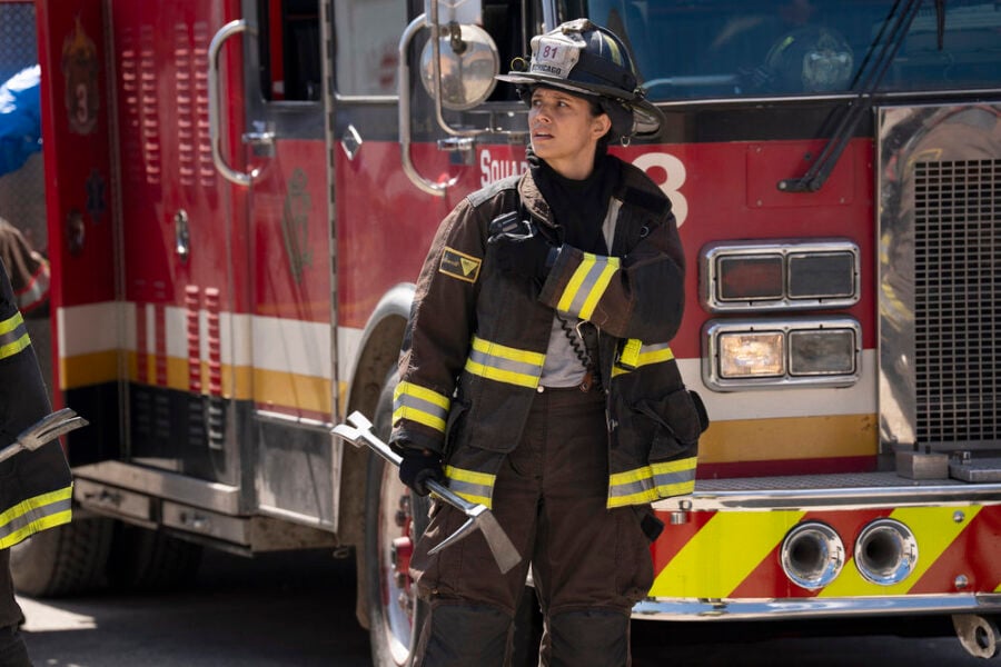 Miranda Rae Mayo as Stella Kidd in front of a fire truck - Chicago Fire Season 15 What to Expect from Chicago Fire Season 15 Episode 3: Take the Hit