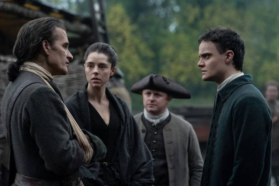 Outlander: Blood of My Blood Season 2 Episode 6 — Left to Right: Alastair MacKenzie ("John Cameron"), Bobby Rainsbury ("Maura Grant MacKenzie"), Seamus McLean Ross ("Colum MacKenzie"). Photo courtesy of STARZ. | Tell-Tale TV Outlander: Blood of My Blood Season 2 Episode 6 — Left to Right: Alastair MacKenzie ("John Cameron"), Bobby Rainsbury ("Maura Grant MacKenzie"), Seamus McLean Ross ("Colum MacKenzie"). Photo courtesy of STARZ. Outlander: Blood of My Blood’s Sam Retford and Bobby Rainsbury on Bringing a Timeless Romance to Life